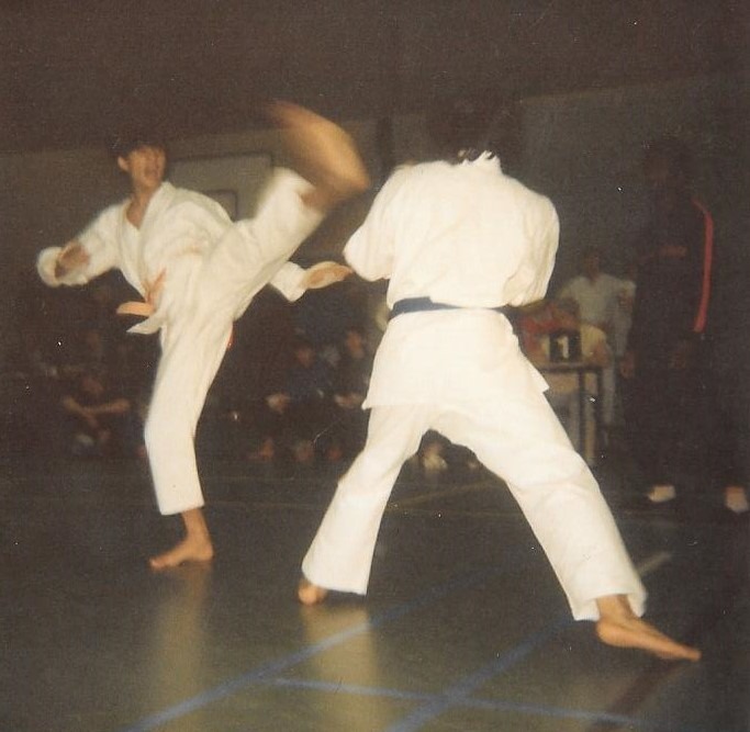 Competing in Kyokushin karate in his teens